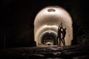Dancing silhouettes in a tunnel Dancing silhouettes in a tunnel